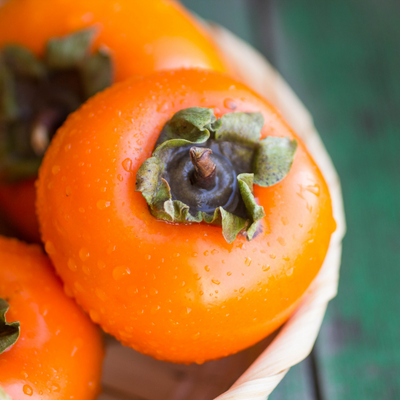 Persimmons in bowl